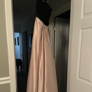 Simple elegant prom dress, strapless with side cutouts.